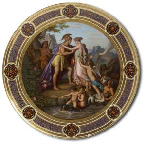 An early 20th 
            century Vienna circular charger the gilt border with stylised foliate bands and cartouche panels, 
            the well painted with a neo-Classical scene of Peleus and Thetis, with cherubic figures with 
            fortresses in the background, overpainted blue beehive mark and painted 'Peleus u Thetis', and 
            impressed Z over 4 - auction estimate &pound;800-1,200