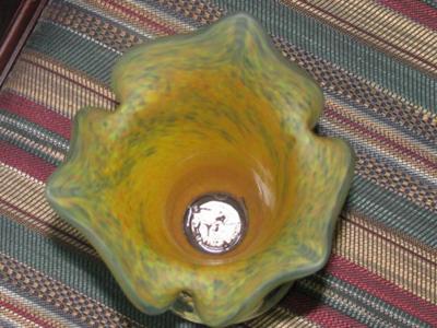 Quarter coin inside the vase