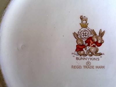 Bunnykins Stamp - Artist mark on far left