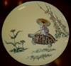 Antique enamel plate with tortoise and mouse